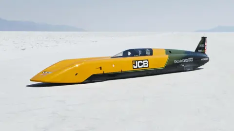 Prodrive The yellow and black JCB Hydromax on the Bonneville Salt Flats.