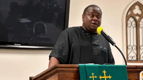 BBC/Brandon Drenon Pastor Javaan Leach preaches the gospel and talks politics with his congregation at Mt Lebanon AME Zion Church