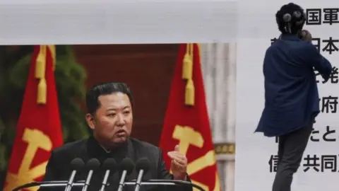 EPA Kim Jong-un on Japan TV screen