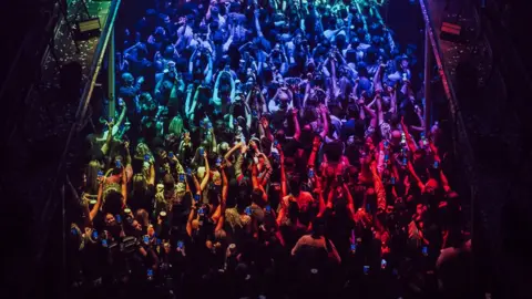 Elliot Young Printworks partygoers