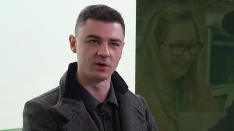 A young man with dark hair