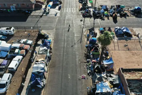 Getty Aerial view of tents scattered along a road