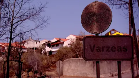 Juan Dominguez, BBC Varzeas - fire-blackened road sign