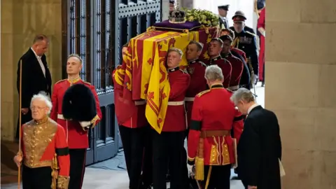 PA Media The Queen's coffin entering Westminster Hall