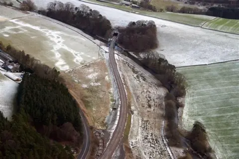 Network Rail An aerial view of the Borders Railway on a frosty day with the track winding its way through the countryside