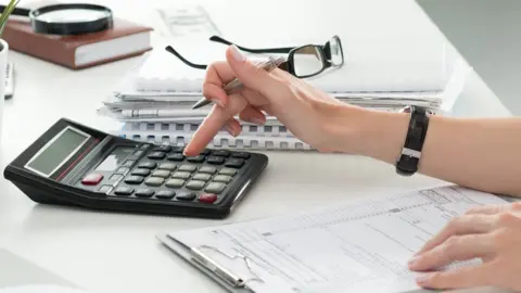 Getty Images Calculator and papers