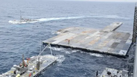 CENTCOM US military handout image showing the construction of the floating JLOTS pier in the Mediterranean Sea (29 April 2024)