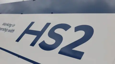 Reuters A HS2 high-speed rail logo is displayed on a fence surrounding a construction site at Euston in London, Britain.