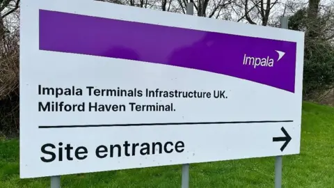 Enterance sign to the Impala Terminal in Milford Heaven.