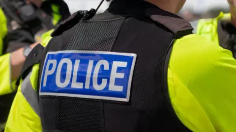 The back of a police officer's uniform