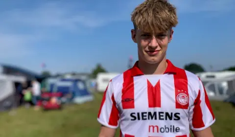 Will in Olympiakos shirt at Latitude