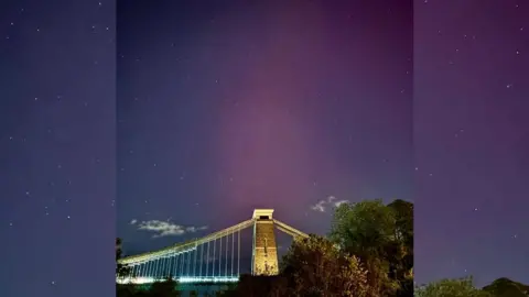 Andrew Cleaver The Clifton Suspension Bridge with the Northern Lights in the night sky in the background