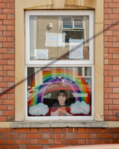 Tom Skipp Huey at the window