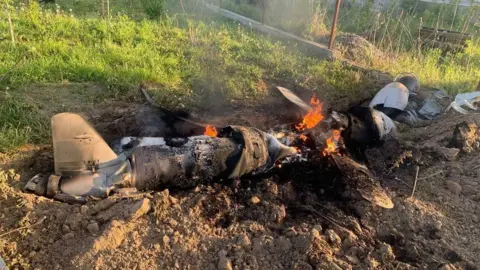 National police of Ukraine via Reuters Photo purportedly showing a Russian cruise missile shot down by Ukraine's air defence in Kyiv region. Photo: 18 May 2023