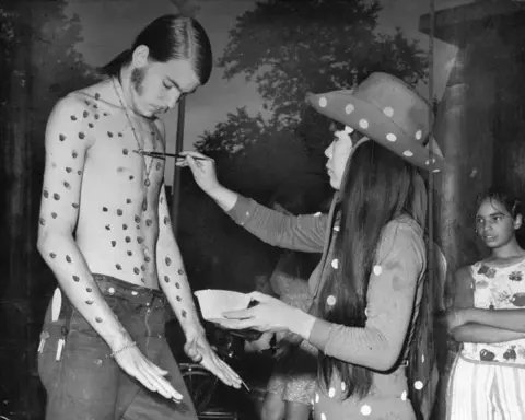 NY Daily News via Getty Images Yayoi Kusama paints body of Kent Feathergill, 1967.