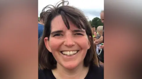 Jocasta Williams A selfie of Jocasta Williams taken at the Town Moor Parkrun. She has brown shoulder-length hair. 