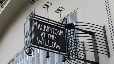 Gibson Digital/National Trust for Scotland A sign that reads Mackintosh At The Willow. 