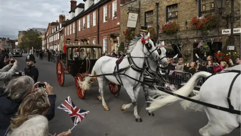 Getty Images Newlyweds Princess Eugenie of York and Jack Brooksbank wave to the crowds from their carriage after their Royal wedding at St. George's Chapel