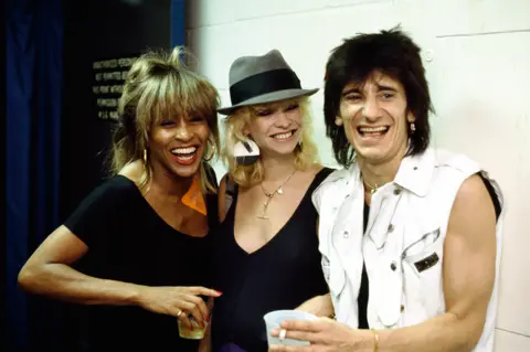 Denis O'Regan Tina Turner with Ronnie Wood of the Rolling Stones and wife Jo, backstage at Madison Square Garden