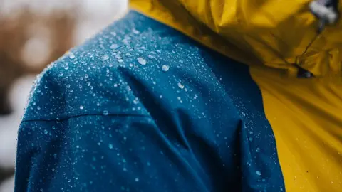 Getty Images Rainjacket with water droplets collecting on the surface