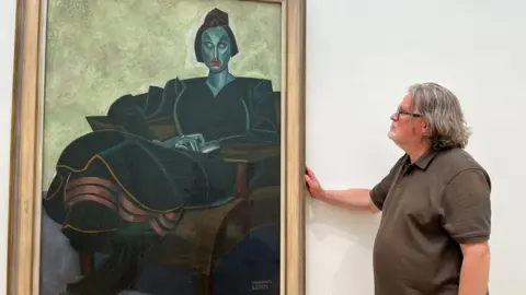 Leeds Art Gallery Nigel Walsh, curator at the gallery studies Praxitella