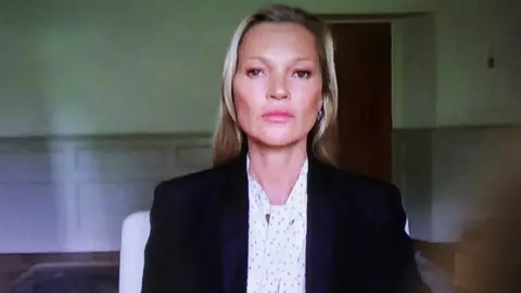 Reuters Kate Moss gives evidence via video link during Johnny Depp"s defamation trial against his ex-wife Amber Heard