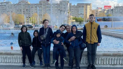 Lilya Onopa Family in Bucharest - with Mum Lilya and friend Laura from the city who has been helping them