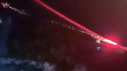 Lucas Albert/Instagram A drone in the air apparently shooting a firework