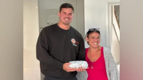 Amanda Crispin Amanda Crispin (right) was so surprised and 'tickled' at her guest