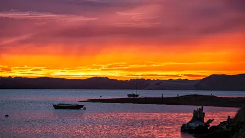 Getty Images Sunset at Morro Bay, California. File photo