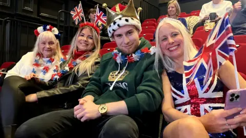 BBC The Saxton family have arrived at the Old Court to celebrate the Coronation and pay their respects to Queen Elizabeth II at Windsor Castle