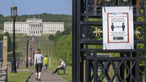 Liam McBurney/PA Socially-distant walking on the Stormont Estate