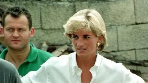 PA Media Paul Burrell with Princess Diana in August 1997