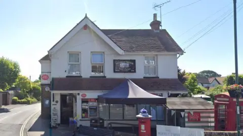 Google A Google maps image of Felpham Post Office, a white building displaying red Post Office signs on the corner of a junction 