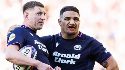 Scotland’s Finn Russell and Sione Tuipulotu 
