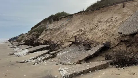 Shaun Whitmore/BBC Coastal erosion at Hemsby