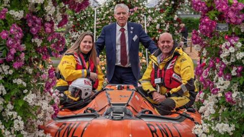 RNLI volunteers and Ian Limmer from Peter Beales