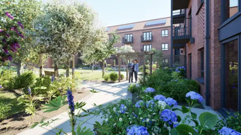 A visualisation of what the homes could look like, with flowers and trees surrounding the blocks of flats, which are built from brown brick and have dark metal railings.