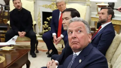 Getty Images Steve Witkoff sits in a chair in the foreground of the Oval Office, surrounded by Marco Rubio, US Vice President JD Vance, Donald Trump and Ukrainian President Volodymyr Zelensky