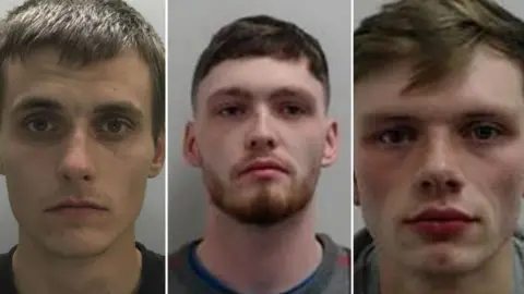 A row of three young men. Left: a police mugshot of thin white man with short brown hair staring at the camera. Middle: A pale white man with a ginger beard and short dark hair looks into the distance. Right a pale man with red cheeks and light brown hair looks straight into the camera.