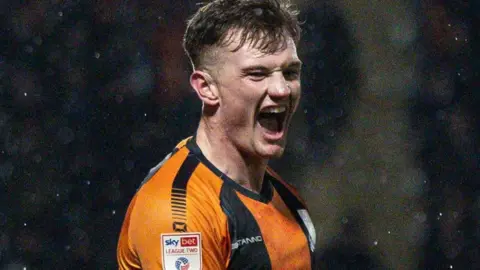 Mark Shelton celebrates a goal for Barnet