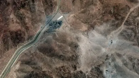 A satellite image shows new airstrike craters on the perimeter of the Fordow Fuel Enrichment Facility, amid the Iran-Israel conflict, near Qom, Iran, June 24, 2025
