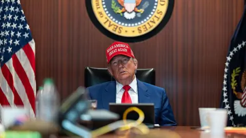 In this handout provided by the White House, U.S. President Donald Trump and Secretary of State Marco Rubio (R) sit in the Situation Room as they monitor the mission that took out three Iranian nuclear enrichment sites, at the White House on June 21, 2025 in Washington, DC.