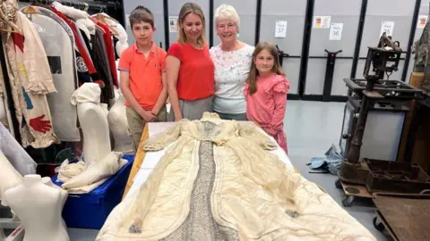 Leeds Museums and Galleries Jennifer Slater with daughter Christina Bromley and Lily's great-great-grandson Alexander and great-great-granddaughter Emmeline