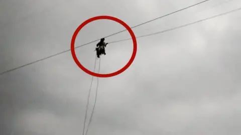 Person laying new cable line in Pakistan