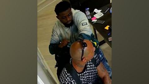 CCTV image of two men taken during robbery at Kew jewellers