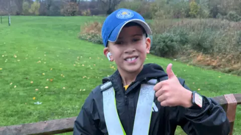 Supplied Andre smiling at the camera