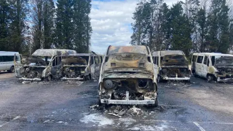 Burnt-out minibuses after Bristol arson attacks