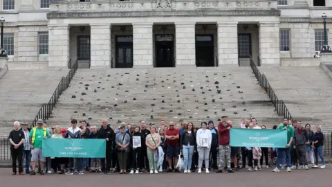 Pacemaker Demonstration at Stormont with shoes lining the steps