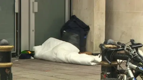 BBC Homeless person in a doorway in Cardiff